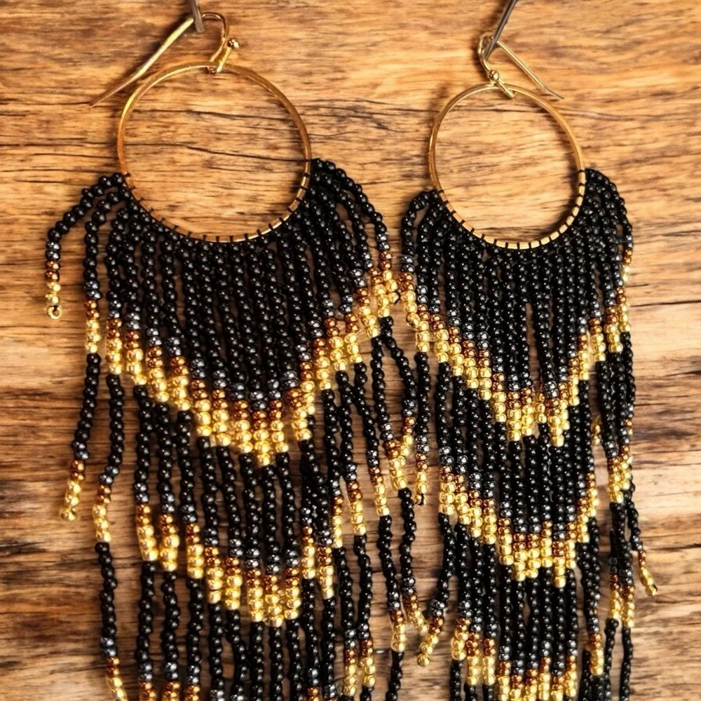 Black and Gold Glass Beaded Chandelier Earrings with Cascading Feather Design